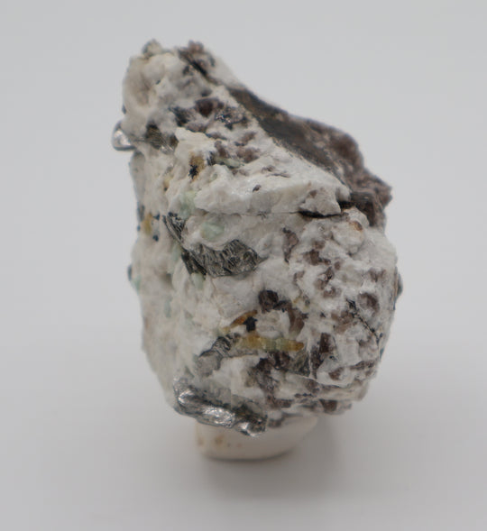 Aquamarine and Heliodor cluster with Mica and Smoky Quartz on Feldspar