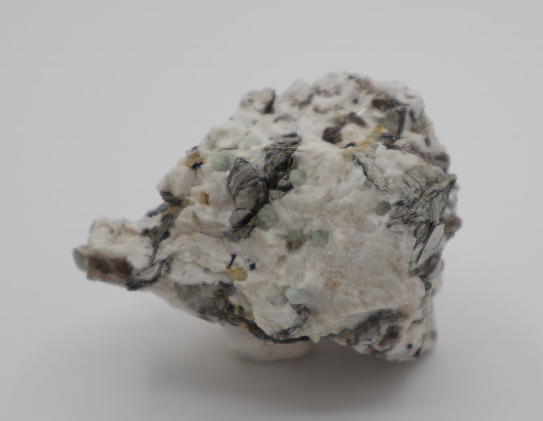 Aquamarine and Heliodor cluster with Mica and Smoky Quartz on Feldspar