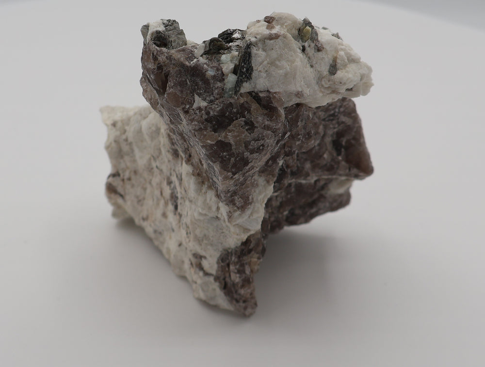 Aquamarine with Mica and Garnet on Smoky Quartz and Feldspar