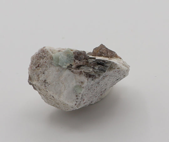 Aquamarine with Mica, Smoky Quartz and Spessartine Garnet on Feldspar