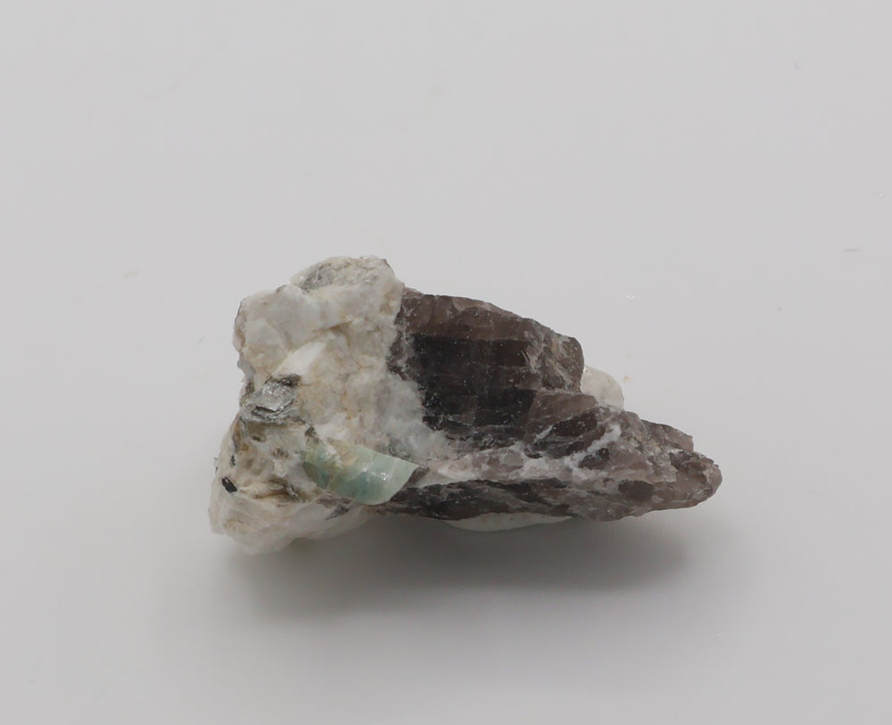 Aquamarine with Mica on Smoky Quartz and Feldspar