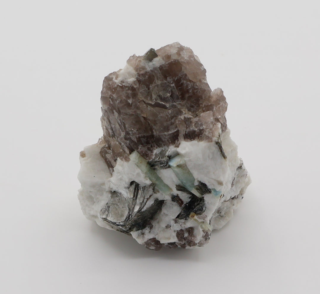 Aquamarine and Bi-Colour Beryl with Spessartine Garnet, Mica, on Smoky Quartz and Feldspar