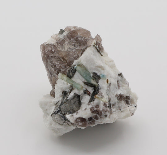 Aquamarine and Bi-Colour Beryl with Spessartine Garnet, Mica, on Smoky Quartz and Feldspar