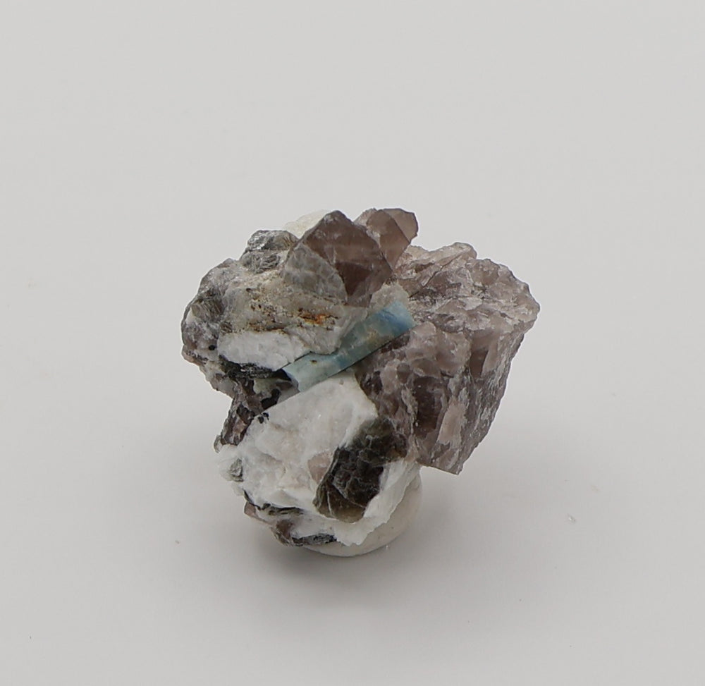 Aquamarine with Mica on Smoky Quartz and Feldspar