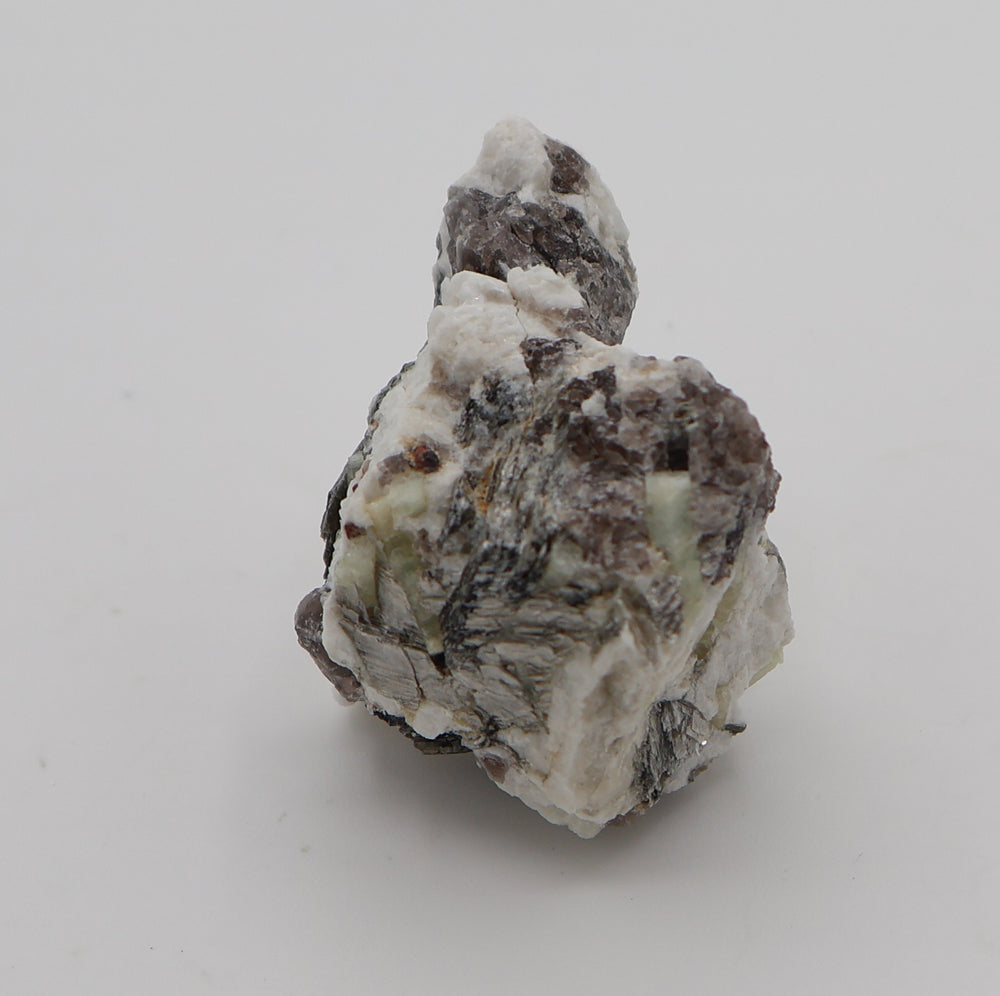 Aquamarine with Hematite, Spessartine Garnet, on Mica, Smoky Quartz, Feldspar