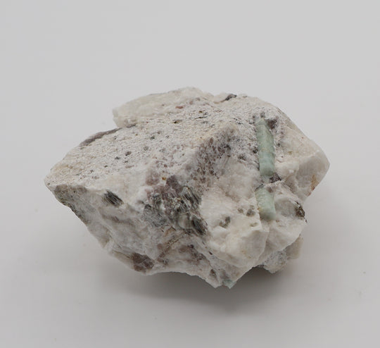 Aquamarine with Spessartine Garnet, Mica, Smoky Quartz, on Feldspar